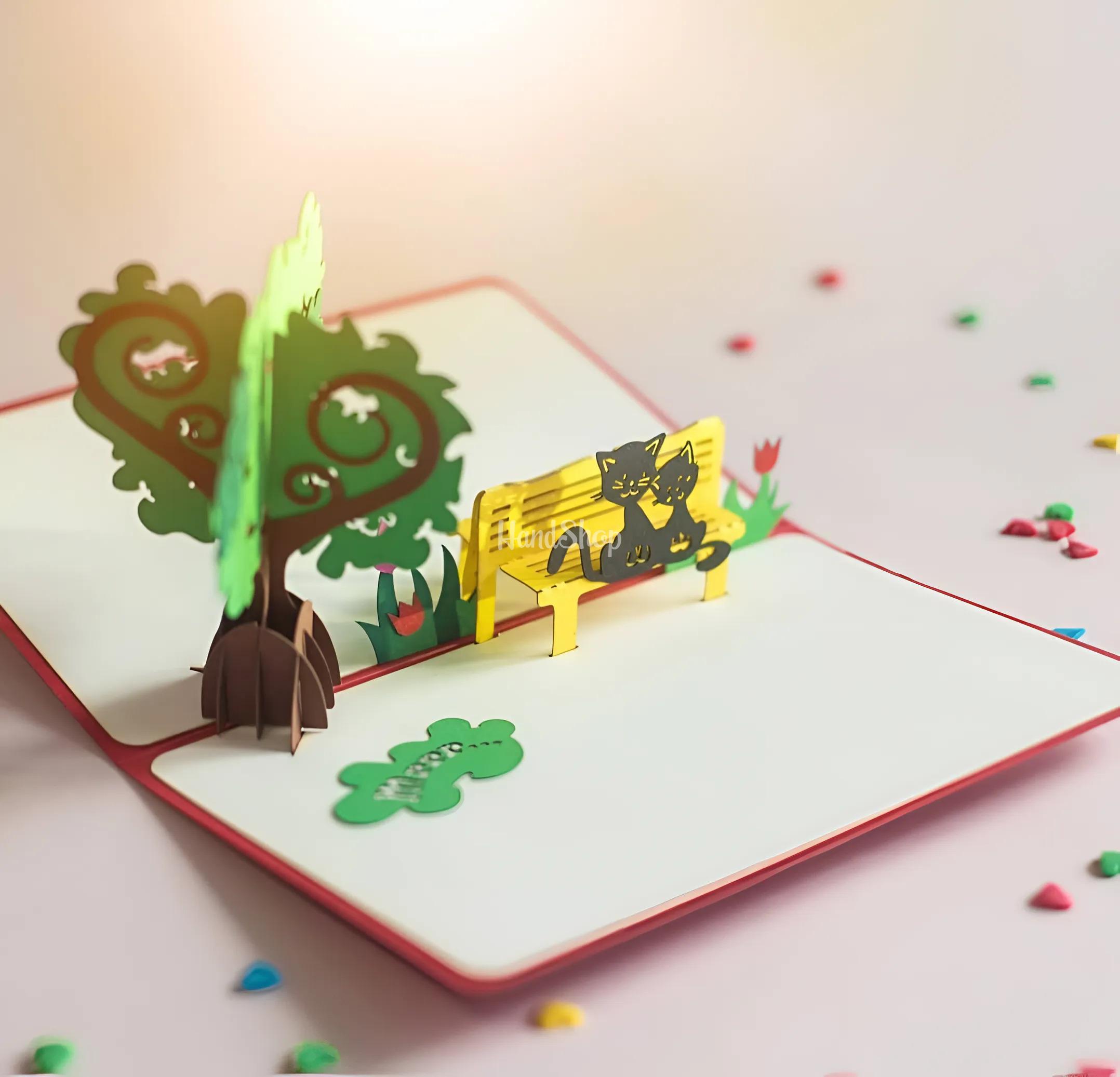 Вітальна листівка валентинка 3d закохана пара коти на лавці Вітальна листівка валентинка 3d закохана пара коти на лавці