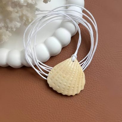 Жіночий літній кулон морська мушля на вощеному шнурі