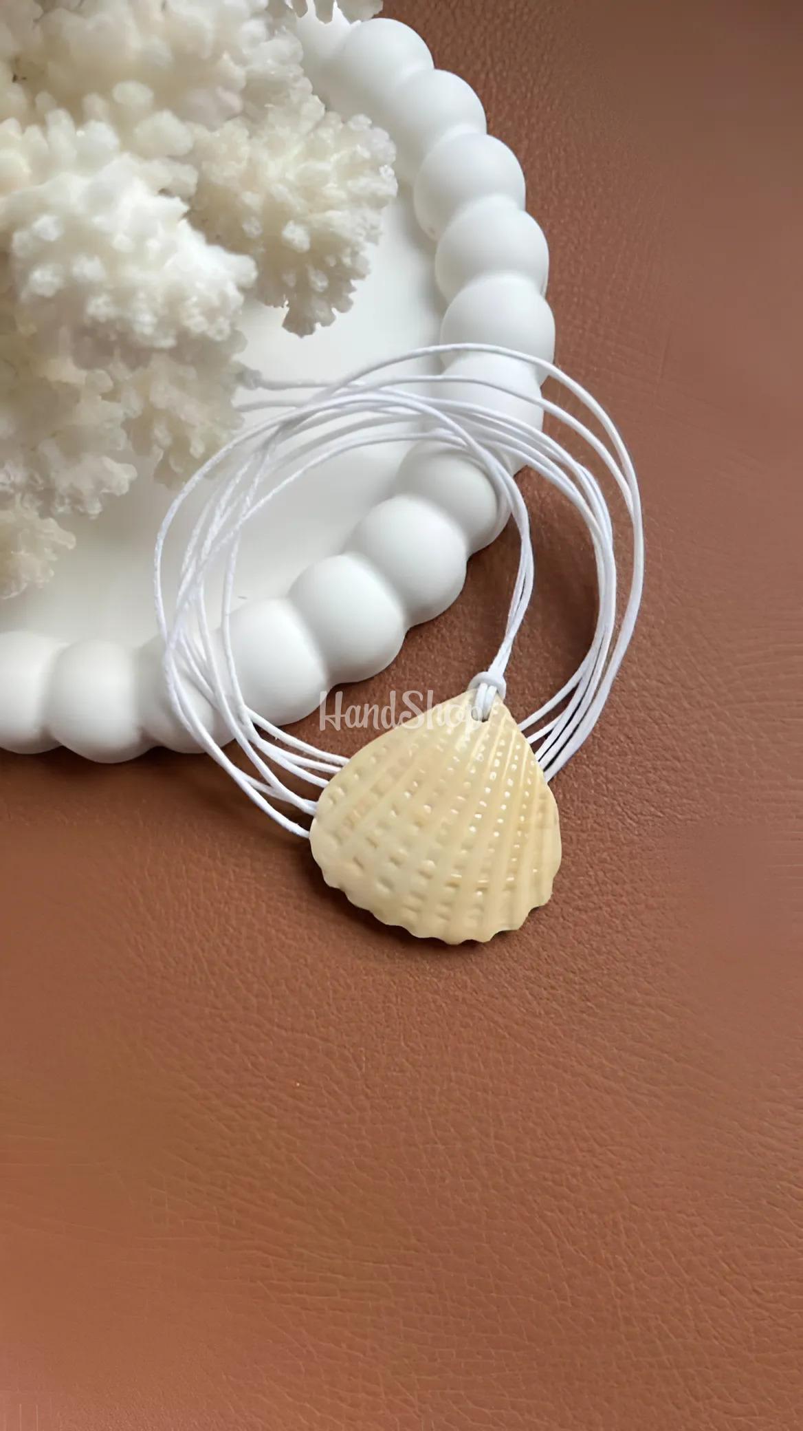 Жіночий літній кулон морська мушля на вощеному шнурі Жіночий літній кулон морська мушля на вощеному шнурі