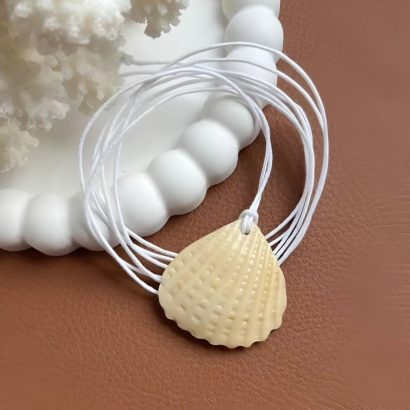 Жіночий літній кулон морська мушля на вощеному шнурі