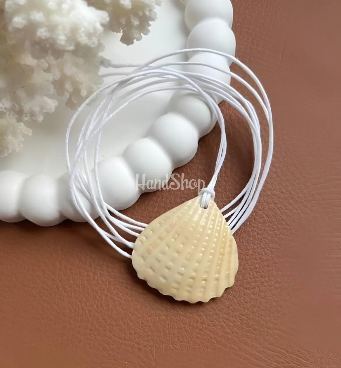 Жіночий літній кулон морська мушля на вощеному шнурі Жіночий літній кулон морська мушля на вощеному шнурі