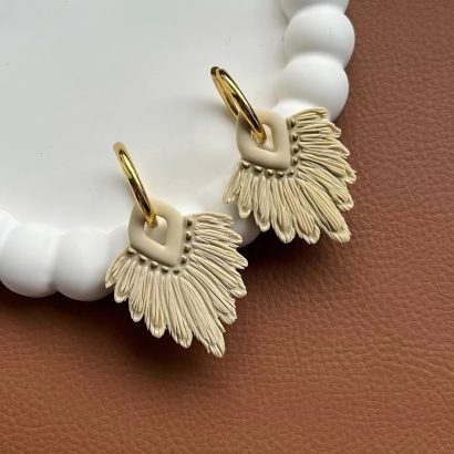 Стильні жіночі сережки з полімерної глини в стилі бохо