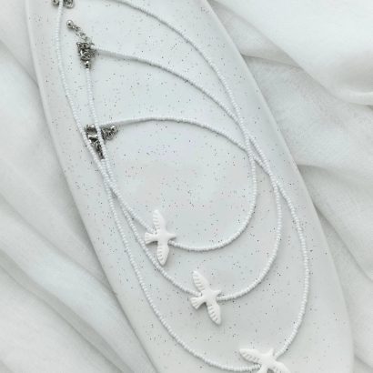 Кулон біла голубка з глини на ювелірному тросику, бісер