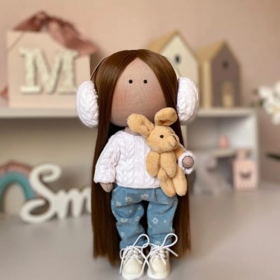 Ігрова лялька текстильна в джинсах зі змінним одягом