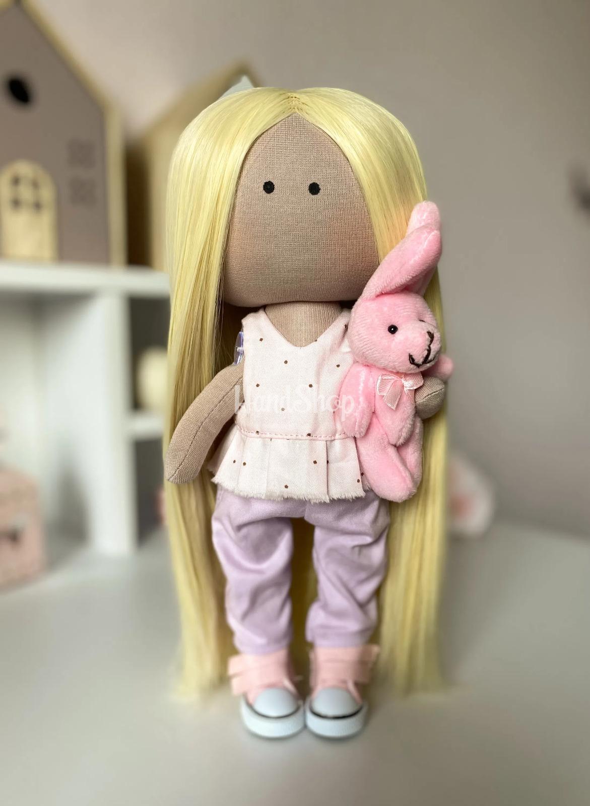 Сувенірна ігрова лялька текстильна з рожевим зайчиком Сувенірна ігрова лялька текстильна з рожевим зайчиком