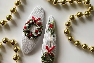 Святкова магія у кожному стібку: новорічні дитячі заколочки клік-клак з вишивкою різдвяні віночки ручної роботи