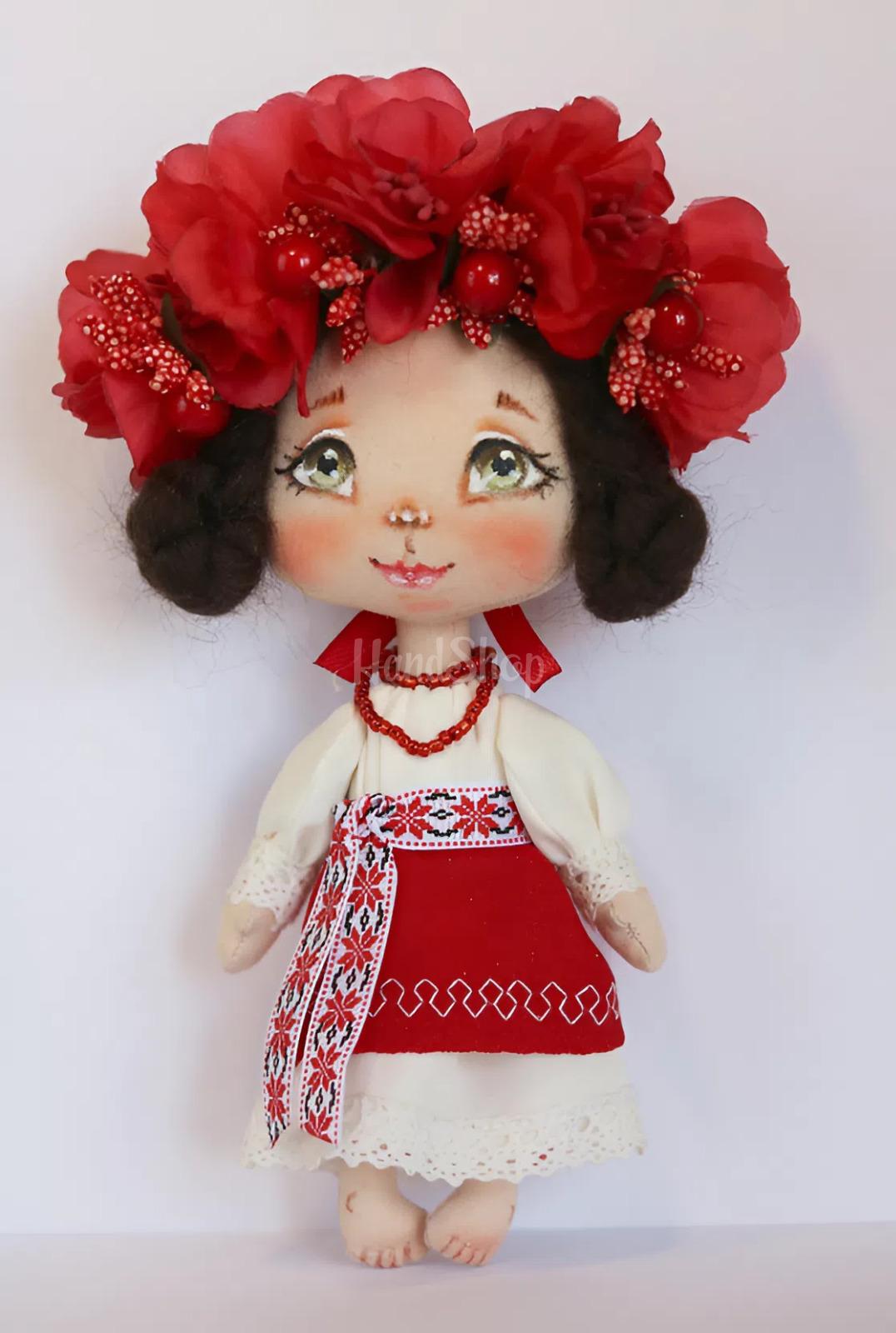 Сувенірна лялька україночка у сукні з червоним віночком Сувенірна лялька україночка у сукні з червоним віночком
