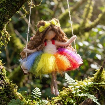 Авторська дитяча лялька оберіг підвіска на гойдалці веселка