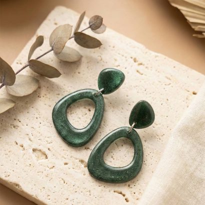Овальні жіночі геометричні сережки з полімерної глини