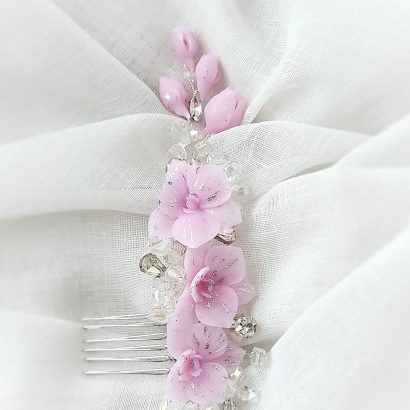 Квітковий гребінець з рожевими квітами з полімерної глини