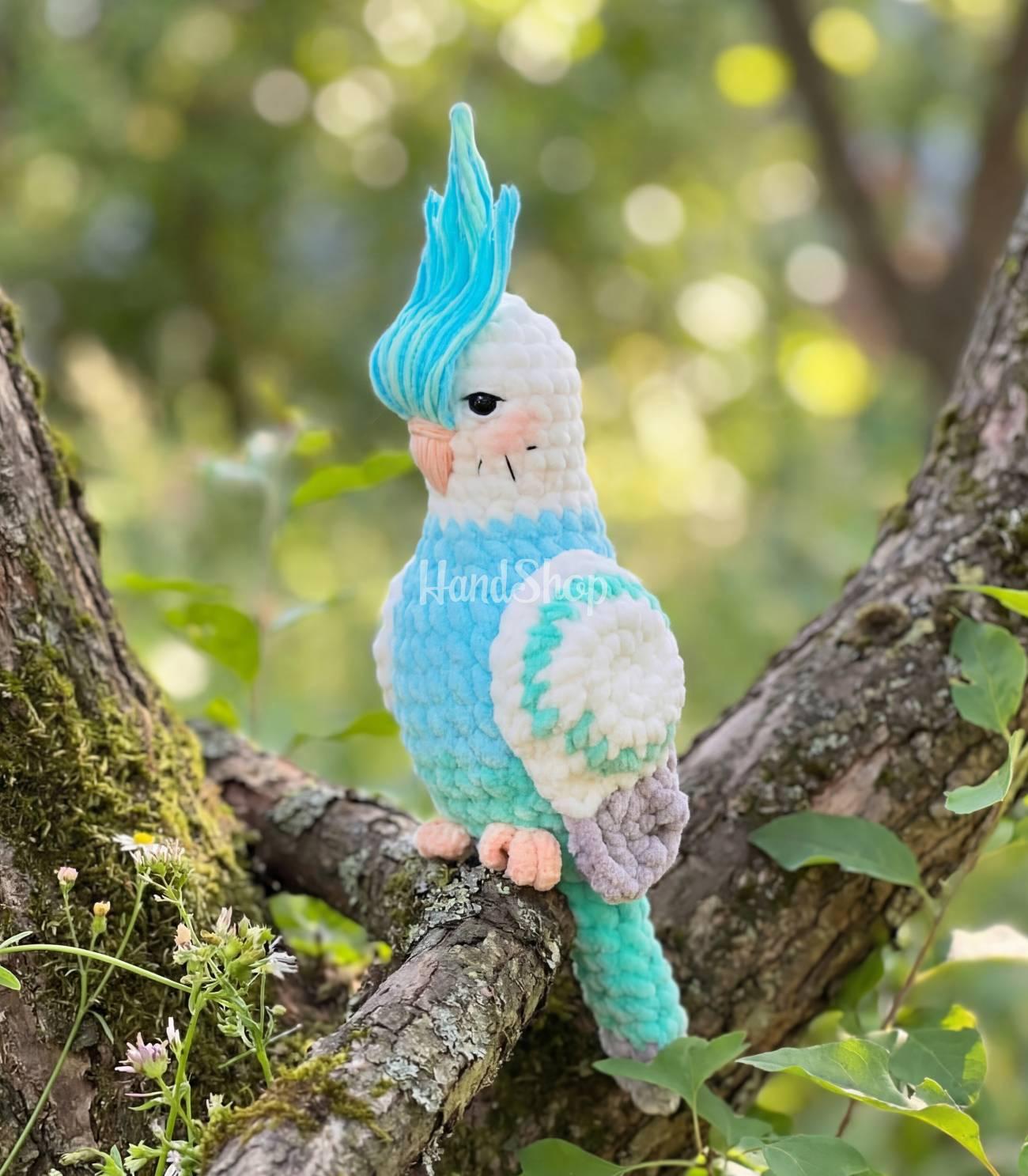 Авторська іграшка в’язаний папуга бірюзово-білий Авторська іграшка в’язаний папуга бірюзово-білий