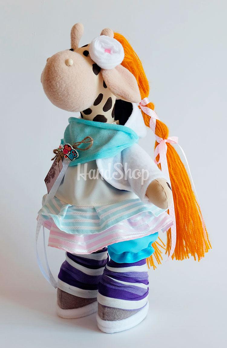 Мягкая игрушка жираф рыжая в платье Мягкая игрушка жираф рыжая в платье