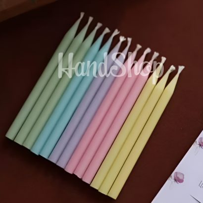 Жіноча листівка рожеві квіти зі свічкою, сірником та чиркалом