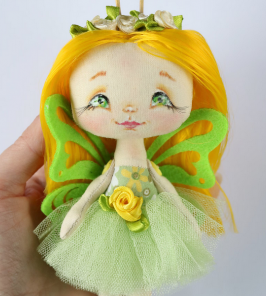 Сувенірна текстильна лялька метелик з жовтим волоссям