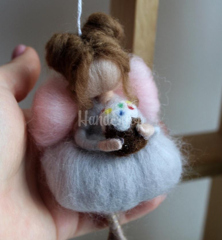 Великодня лялька фея веснянка у сукні з пасочкою підвіска Великодня лялька фея веснянка у сукні з пасочкою підвіска